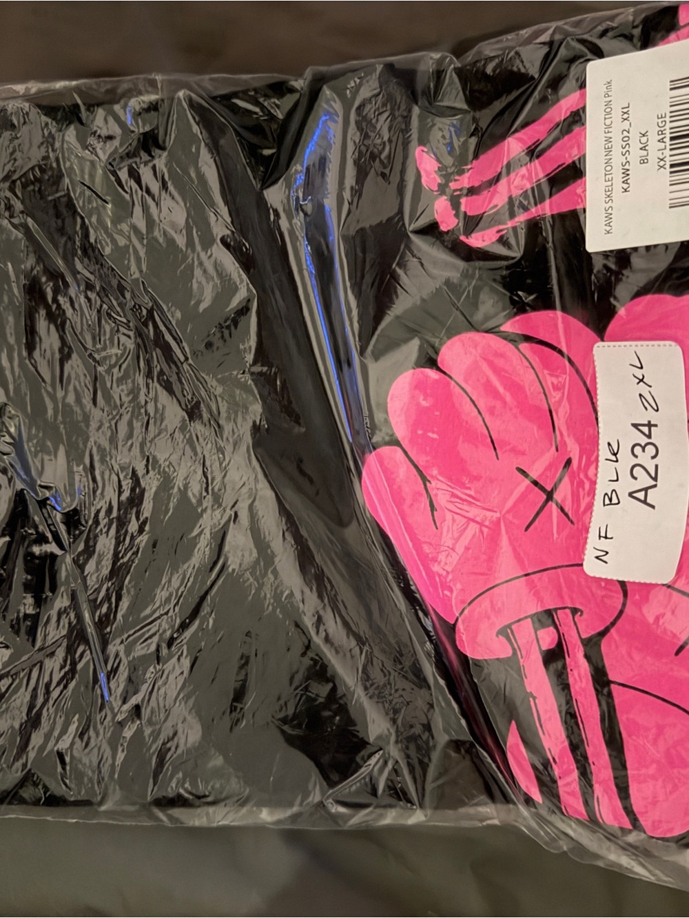 KAWS Black Short Sleeve Tee with Pink Graphic